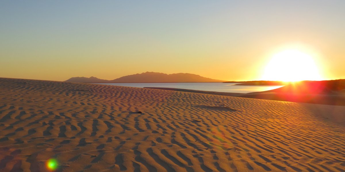 sand dunes at sunrise
