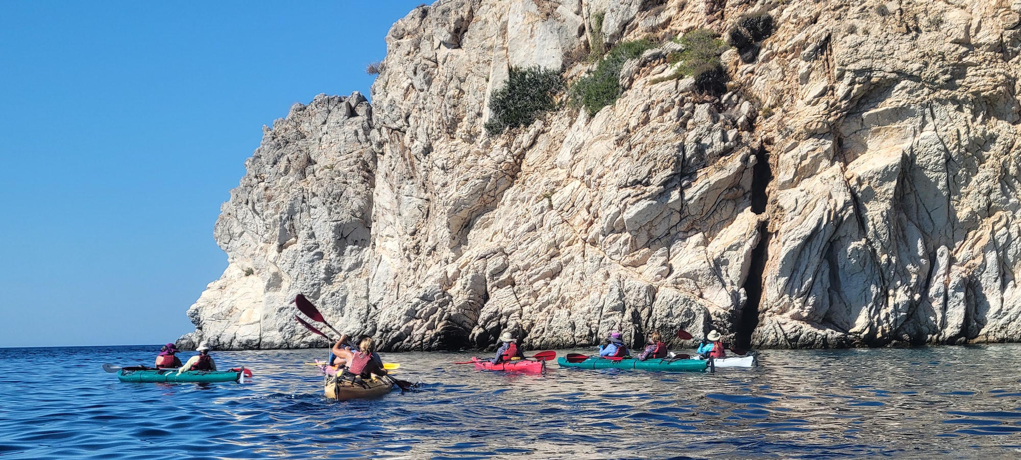 Sea kayakers paddling along the Carian Coast in Turkey