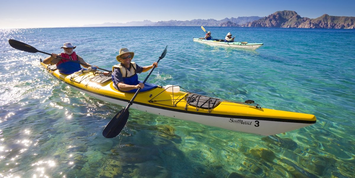 Tandem kayaking around Parque Nactional Bahia de Loreto in the Sea of Cortez on a sunny day