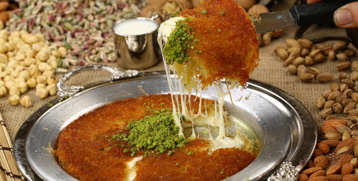 Turkish Kunefe desert topped with pistachio nuts