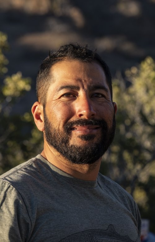 Sea Kayak Adventures kayaking guide, Damian, smiling for a photo.