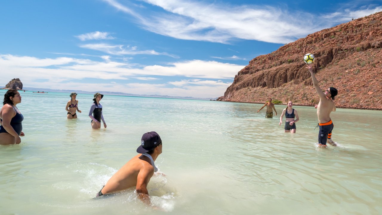 people playing volleyball in sea of cortez
