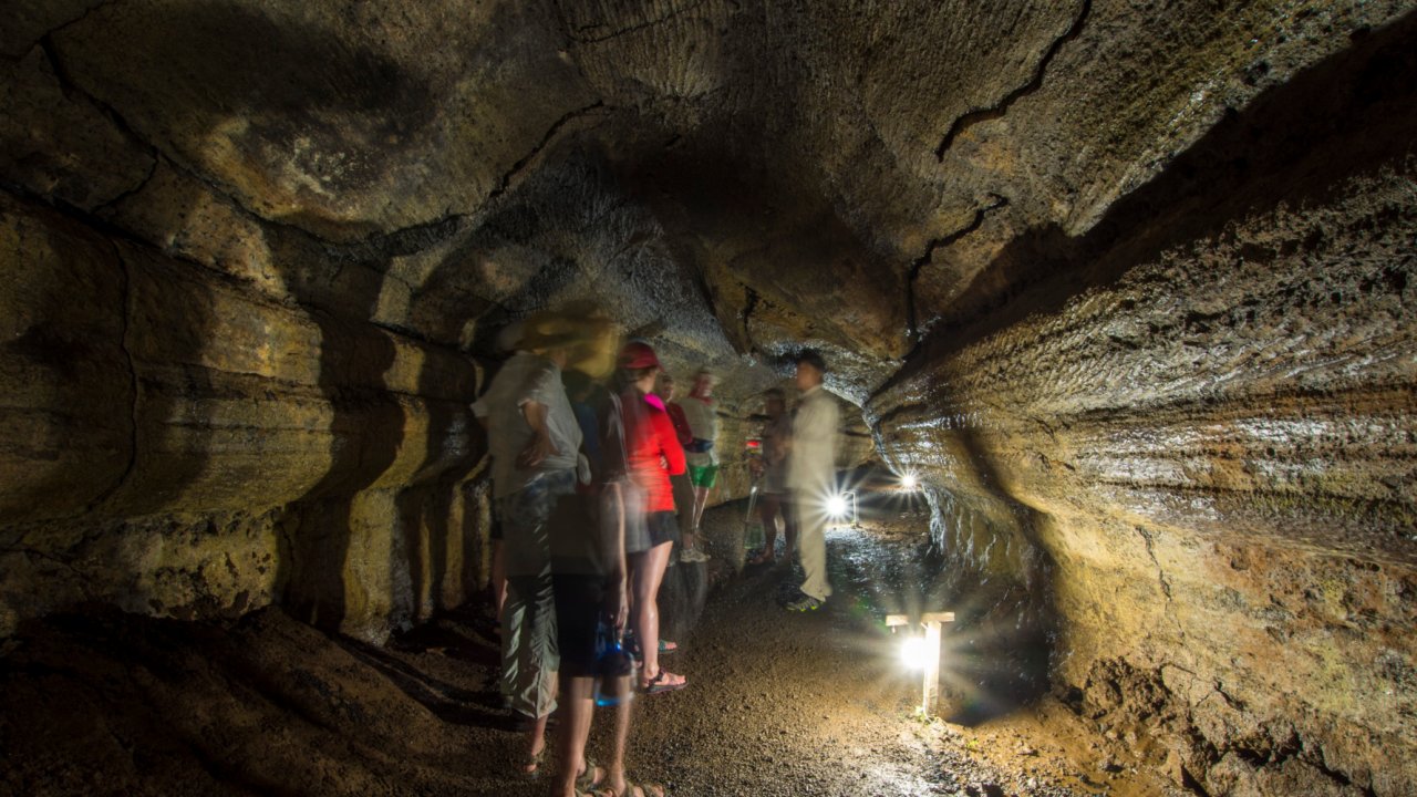 exploring a cave in galapagos