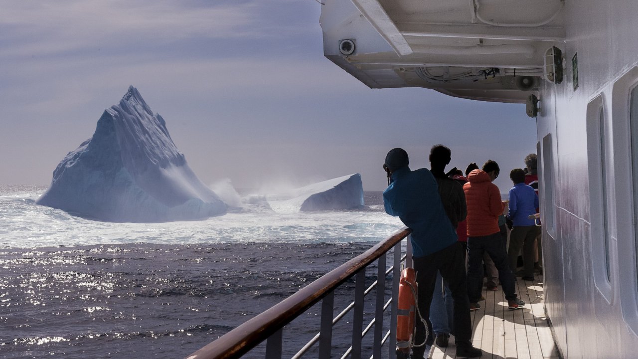 people on deck of cruise ship in antarctica