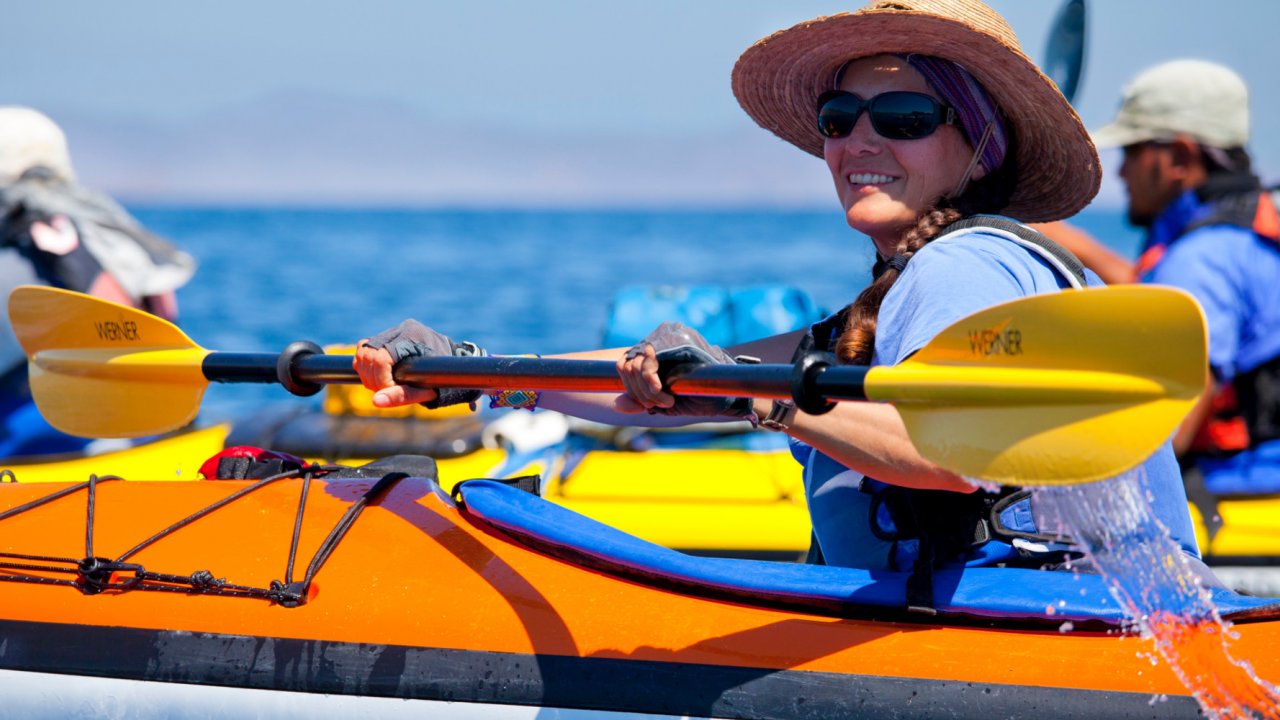 woman in sea kayak