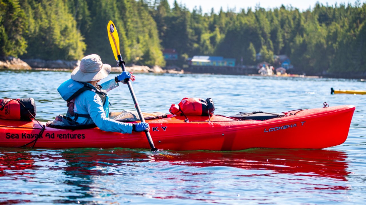 paddler in red sea kayak