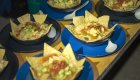 Burrito bowl with tortilla chips served in individual bowls
