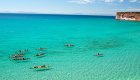 People sea kayaking in the Sea of Cortez outside of La Paz