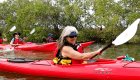 woman in sea kayak in cuba