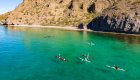 People sea kayaking in the Sea of Cortez in the sun
