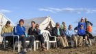 A group of whale watchers sitting on the beach in Baja California Sur