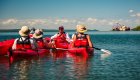group of kayakers in water in cuba