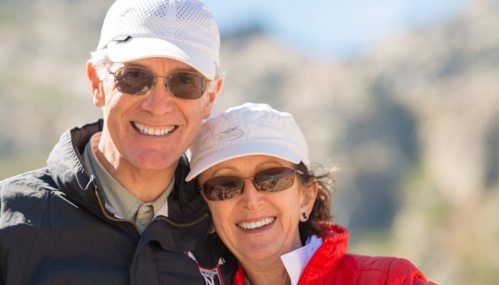 smiling couple on a trip